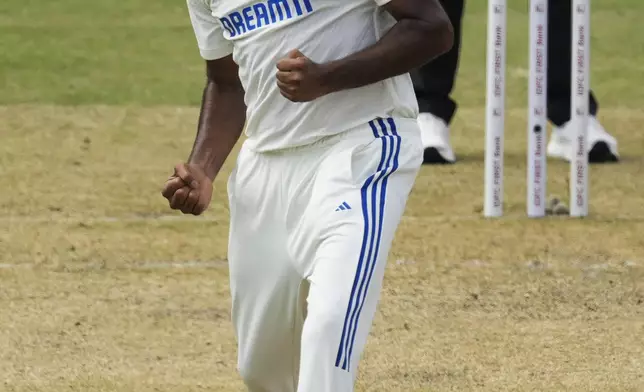India's Ravichandran Ashwin celebrate the wicket of Bangladesh's captain Najmul Hossain Shanto on the first day of the second cricket test match between Bangladesh and India in Kanpur, India, Friday, Sept. 27, 2024. (AP Photo/Ajit Solanki)