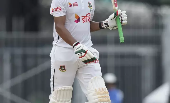 Bangladesh's captain Najmul Hossain Shanto celebrates his fifty runs on the third day of the first cricket test match between India and Bangladesh, in Chennai, India, Saturday, Sept. 21, 2024. (AP Photo/Mahesh Kumar A.)