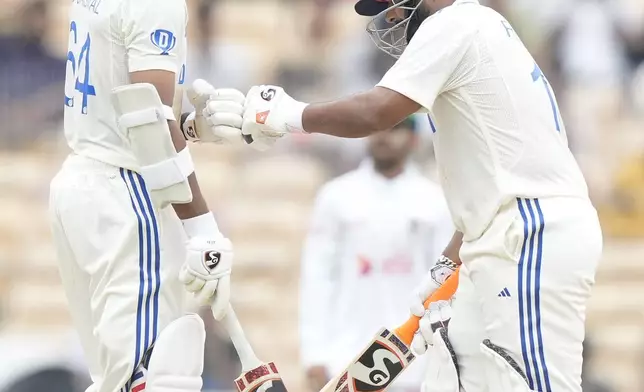 India's Yashasvi Jaiswal, left,Rishabh Pant encourage each other as they bats on the first day of the first cricket test match between India and Bangladesh, in Chennai, India, Thursday, Sept.19, 2024. (AP Photo/Mahesh Kumar A.)