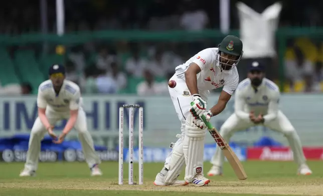 Bangladesh's captain Najmul Hossain Shanto plays a shot on the first day of the second cricket test match between Bangladesh and India in Kanpur, India, Friday, Sept. 27, 2024. (AP Photo/Ajit Solanki)