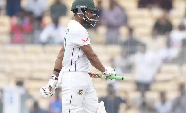 Bangladesh's captain Najmul Hossain Shanto walks to the pavilion after losing his wicket on the fourth day of the first cricket test match between India and Bangladesh, in Chennai, India, Sunday, Sept. 22, 2024. (AP Photo/Mahesh Kumar A.)