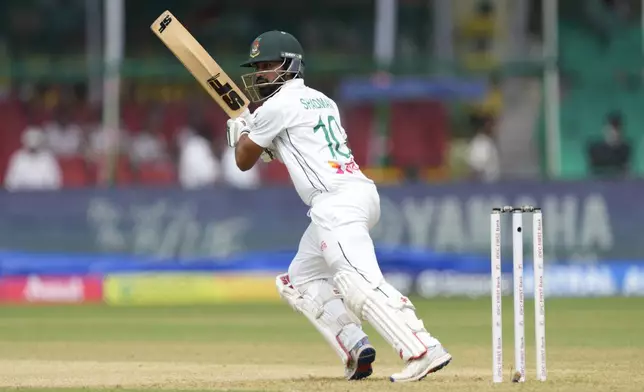 Bangladesh's Shadman Islam plays a shot on the first day of the second cricket test match between Bangladesh and India in Kanpur, India, Friday, Sept. 27, 2024. (AP Photo/Ajit Solanki)