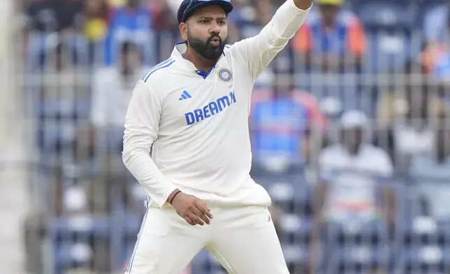 India's captain Rohit Sharma reacts while fields on the fourth day of the first cricket test match between India and Bangladesh, in Chennai, India, Sunday, Sept. 22, 2024. (AP Photo/Mahesh Kumar A.)