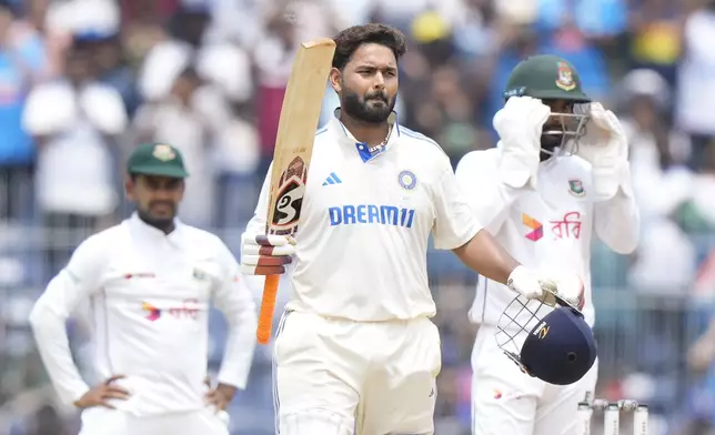 India's Rishabh Pant celebrates scoring a century on the third day of the first cricket test match between India and Bangladesh, in Chennai, India, Saturday, Sept. 21, 2024. (AP Photo/Mahesh Kumar A.)