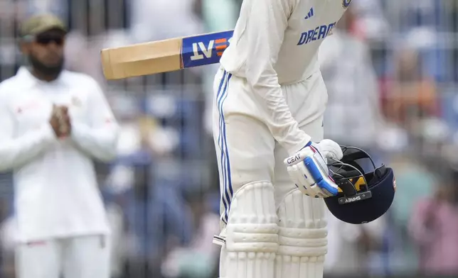 India's Shubman Gill celebrates scoring a century on the third day of the first cricket test match between India and Bangladesh, in Chennai, India, Saturday, Sept. 21, 2024. (AP Photo/Mahesh Kumar A.)