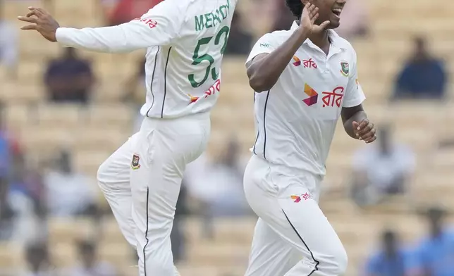 Bangladesh's Hasan Mahmud, right, celebrates the wicket of India's Shubman Gill on the first day of the first cricket test match between India and Bangladesh, in Chennai, India, Thursday, Sept.19, 2024. (AP Photo/Mahesh Kumar A.)