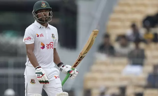 Bangladesh's captain Najmul Hossain Shanto celebrates his fifty runs on the third day of the first cricket test match between India and Bangladesh, in Chennai, India, Saturday, Sept. 21, 2024. (AP Photo/Mahesh Kumar A.)