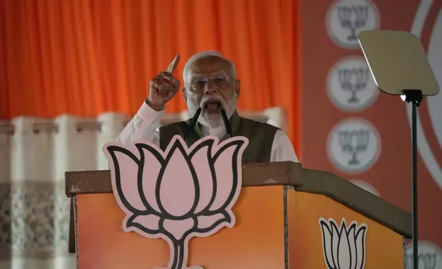 Indian Prime Minister Narendra Modi addresses an election rally in Srinagar, Indian controlled Kashmir, Thursday, Sept. 19, 2024. (AP Photo/Mukhtar Khan)