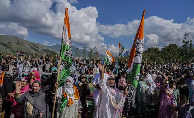 Supporters of India's opposition Congress party, wave during an election rally at Dooru some 78 kilometers (49 miles) south of Srinagar, Indian controlled Kashmir,Wednesday, Sept. 4, 2024. (AP Photo/Mukhtar Khan, File)