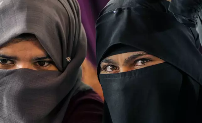 Supporters of Indian Prime Minister Narendra Modi attend an election rally in Srinagar, Indian controlled Kashmir,Thursday, Sept.19, 2024. (AP Photo/Mukhtar Khan)