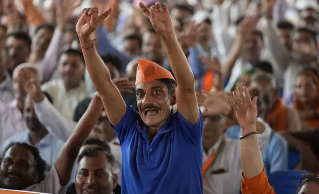 Bharatiya Janata Party (BJP) party workers attend a rally, ahead of Jammu and Kashmir Assembly elections in Jammu, India, Saturday Sep.7, 2024.(AP Photo/Channi Anand, File)