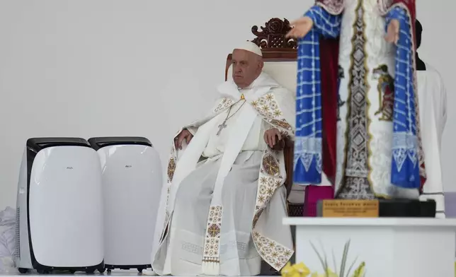 Pope Francis leads the holy mass at Gelora Bung Karno Stadium in Jakarta, Indonesia, Thursday, Sept. 5, 2024. (AP Photo/Achmad Ibrahim, Pool)