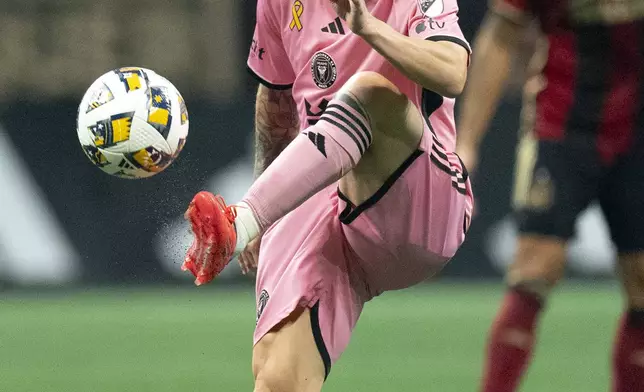 Inter Miami forward Lionel Messi controls the ball during the second half of a MLS soccer match against Atlanta United Wednesday, Sept. 18, 2024. (AP Photo/John Bazemore)