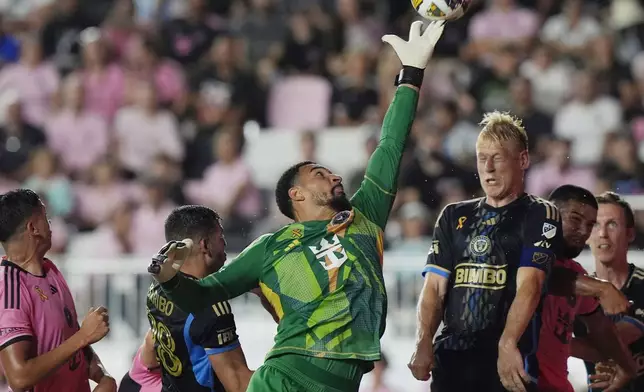 FILE - Inter Miami goalkeeper Drake Callender, center, deflects a corner kick during the first half of an MLS soccer match against the Philadelphia Union, Sept. 14, 2024, in Fort Lauderdale, Fla. (AP Photo/Marta Lavandier, File)