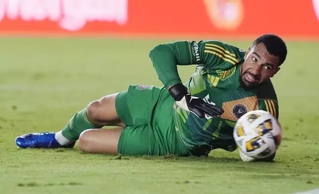 Inter Miami goalkeeper Drake Callender stops a kick on goal during the first half of an MLS soccer match against the Philadelphia Union, Saturday, Sept. 14, 2024, in Fort Lauderdale, Fla. (AP Photo/Marta Lavandier)