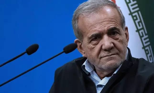 Iranian President Masoud Pezeshkian listens to a question during a press conference in Tehran, Iran, Monday, Sept. 16, 2024. (AP Photo/Vahid Salemi)