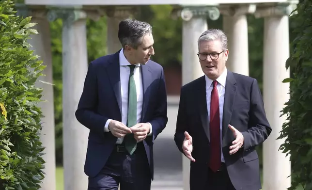 The Prime Minister of Ireland Simon Harris, left listens to his British counterpart Keir Starmer as they meet for talks at Farmleigh House in Dublin, Ireland, Saturday, Sept. 7, 2024. (AP Photo/Peter Morrison Pool)