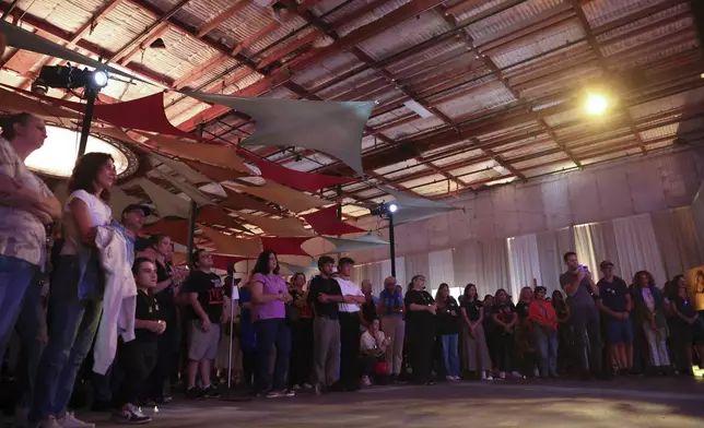 Mourners gather during a vigil Sunday, Sept. 1, 2024, in Culver City, Calif., for the six hostages who were found dead in Rafah, southern Gaza. (AP Photo/Ryan Sun)