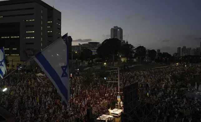 People take part in a protest calling for a deal for immediate release of hostages held in the Gaza Strip by the Hamas militant group, in Tel Aviv, Israel, Sunday, Sept. 1, 2024. (AP Photo/Ariel Schalit)