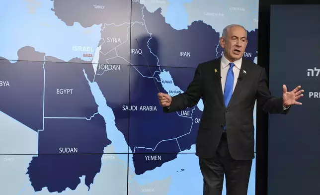 Israeli Prime Minister Benjamin Netanyahu stands before a map during a press conference at the Government Press office in Jerusalem, Wednesday, Sept. 4, 2024. (Abir Sultan/Pool via AP)