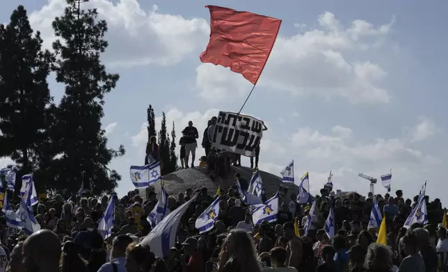 People take part in a protest to call for the immediate release of hostages held in the Gaza Strip by the Hamas militant group in Jerusalem, Sunday, Sept. 1, 2024. (AP Photo/Mahmoud Illean)