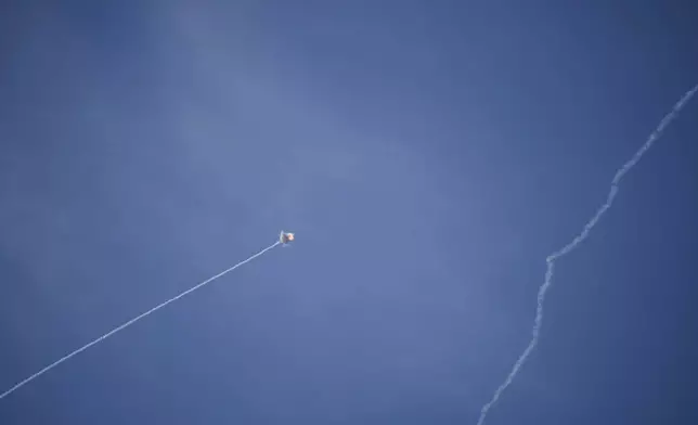 Israeli Iron Dome air defense system fires to intercept a rocket fired from Lebanon, in northern Israel, Friday, Sept. 20, 2024. (AP Photo/Leo Correa)