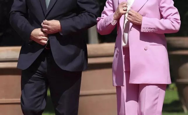 British Prime Minister Keir Starmer attends a welcome ceremony with Italian Prime Minister Giorgia Meloni, right, on the occasion of his visit, at Villa Doria Pamphilj, in Rome, Monday, Sept. 16, 2024. (Phil Noble/Pool Photo via AP)