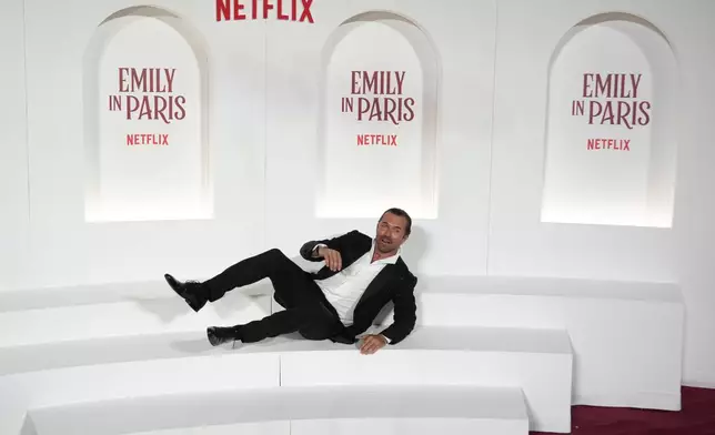 Actor William Abadie poses as he arrives at the premiere of "Emily in Paris", in Rome, Tuesday, Sept. 10, 2024. (AP Photo/Andrew Medichini)