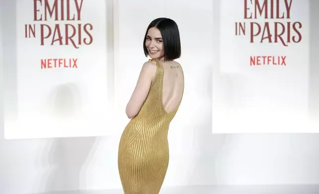 Actress Lily Collins arrives at the premiere of "Emily in Paris", in Rome, Tuesday, Sept. 10, 2024. (AP Photo/Andrew Medichini)