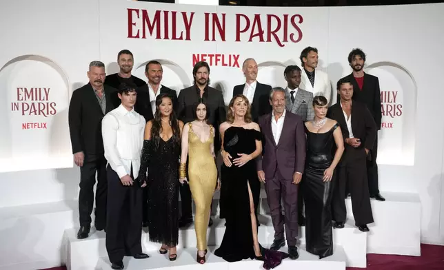 The cast of "Emily in Paris" poses before the premiere in Rome, Tuesday, Sept. 10, 2024. (AP Photo/Andrew Medichini)