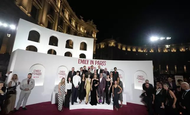 The cast of "Emily in Paris" poses before the premiere in Rome, Tuesday, Sept. 10, 2024. (AP Photo/Andrew Medichini)