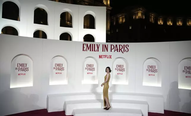 Actress Lily Collins arrives at the premiere of "Emily in Paris", in Rome, Tuesday, Sept. 10, 2024. (AP Photo/Andrew Medichini)