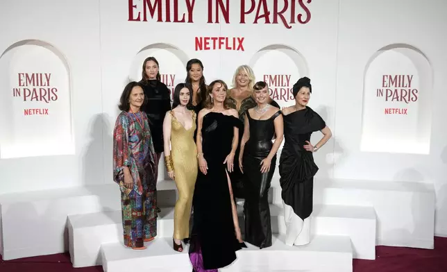 The cast of "Emily in Paris" poses before the premiere in Rome, Tuesday, Sept. 10, 2024. (AP Photo/Andrew Medichini)