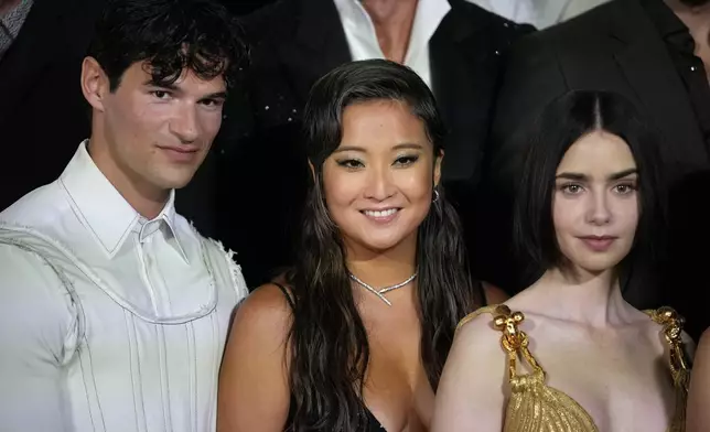 From left, actors Paul Forman, Ashley Park and Lily Collins arrive at the premiere of "Emily in Paris", in Rome, Tuesday, Sept. 10, 2024. (AP Photo/Andrew Medichini)