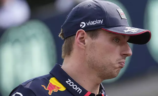 Red Bull driver Max Verstappen of the Netherlands grimaces during driver's parade ahead of the Italy's Formula One Grand Prix at the Monza racetrack, in Monza, Italy, Sunday, Sep.1, 2024 (AP Photo/Luca Bruno)