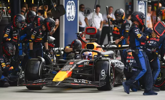 Red Bull driver Max Verstappen of the Netherlands gets a pit service during the Formula One Italian Grand Prix race at the Monza racetrack, in Monza, Italy, Sunday, Sept. 1, 2024. ({byline}/Pool Photo via AP)