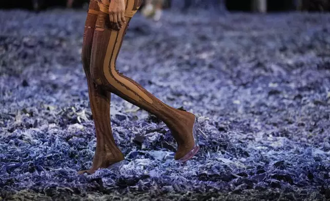 A model wears a creation as part of the Diesel Spring Summer 2025 collection, that was presented in Milan, Italy, Saturday, Sept. 21, 2024. (AP Photo/Luca Bruno).