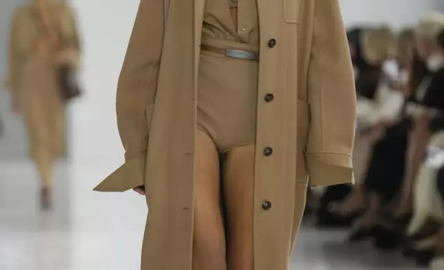 A model wears a creation as part of the Max Mara Spring Summer 2025 collection, that was presented in Milan, Italy, Thursday, Sept. 19, 2024. (AP Photo/Antonio Calanni).