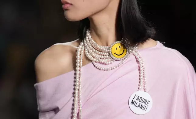 A model wears a creation as part of the Moschino Spring Summer 2025 collection that was presented in Milan, Italy, Thursday, Sept. 19, 2024. (AP Photo/Luca Bruno)