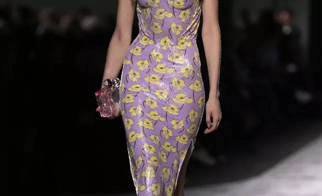 A model wears a creation as part of the Versace Spring Summer 2025 collection, that was presented in Milan, Italy, Friday, Sept. 20, 2024. (AP Photo/Antonio Calanni)