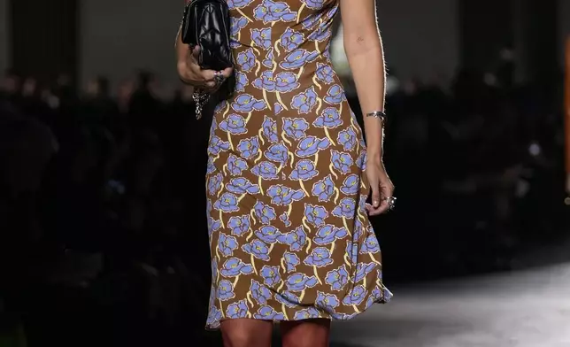 A model wears a creation as part of the Versace Spring Summer 2025 collection, that was presented in Milan, Italy, Friday, Sept. 20, 2024. (AP Photo/Antonio Calanni)