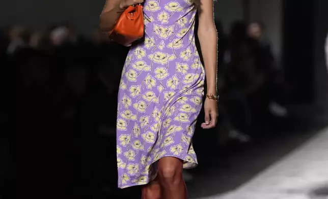 A model wears a creation as part of the Versace Spring Summer 2025 collection, that was presented in Milan, Italy, Friday, Sept. 20, 2024. (AP Photo/Antonio Calanni)