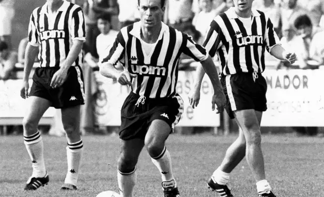 Juventus' Salvatore "Totò" Schillaci, center, attends a team training session with teammates Giancarlo Marocchi, left, and Oleksandr Zavarov, in Turin, Italy, between 1989 and 1990. (LaPresse via AP)