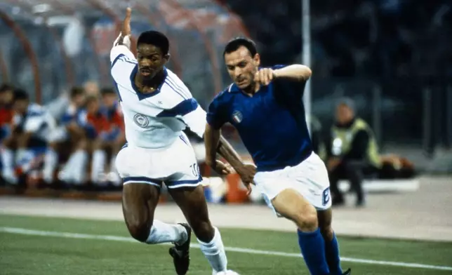 Italy's Salvatore "Totò" Schillaci, right, in action during a World Cup soccer match between Italy and the United States, in Rome, on June 14, 1990. (LaPresse via AP)