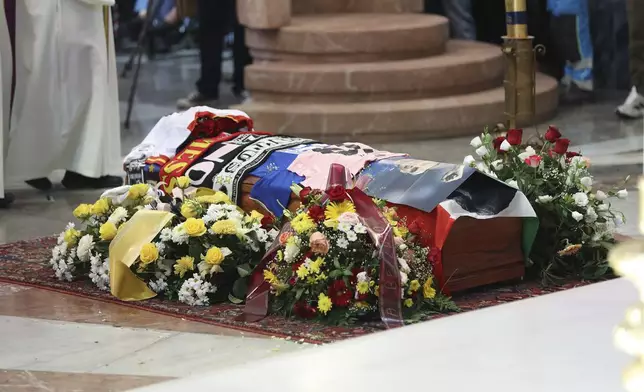 The coffin of Italian World Cup hero Salvatore Toto' Schillaci during his funeral ceremony at the Palermo cathedral, Italy, Friday, Sept. 20, 2024. (Alberto Lo Bianco/LaPresse via AP)