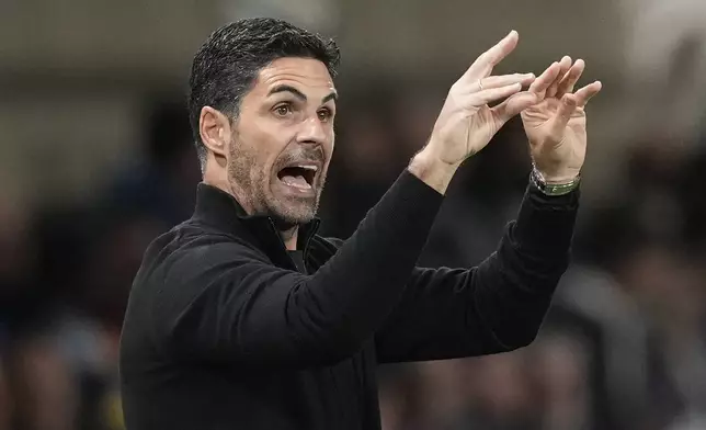 Arsenal's manager Mikel Arteta gestures during the Champions League opening phase soccer match between Atalanta and Arsenal at the Bergamo's stadium in Bergamo, Italy, Thursday, Sept. 19, 2024. (AP Photo/Antonio Calanni)