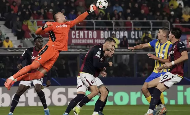 Bologna's goalkeeper Lukasz Skorupski in action during the Champions League opening phase soccer match between FC Bologna and Shakhtar Donetsk in Bologna, Italy, Wednesday, Sept. 18, 2024. (Massimo Paolone/LaPresse via AP)