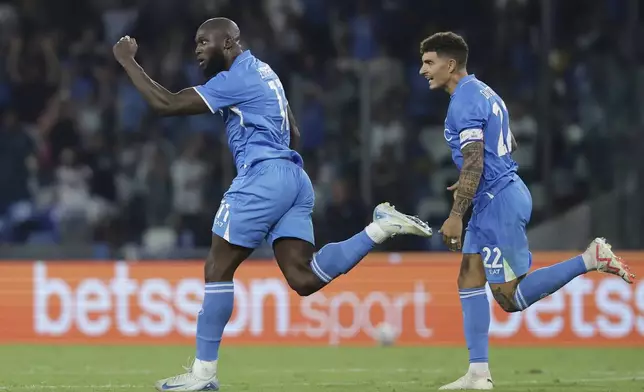 Napoli's Romelu Lukaku celebrates after scoring goal 1-1 during the Serie A soccer match between Napoli and Parma at the Diego Armando Maradona Stadium in Naples, italy - Saturday Aug. 31, 2024. (Alessandro Garofalo/LaPresse via AP)