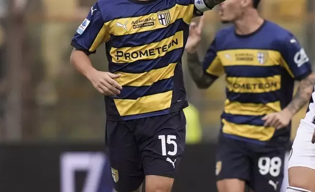 Parma's Enrico Del Prato celebrates after scoring their side's first goal of the game during the Serie A soccer match between Parma and Udinese, at Ennio Tardini Stadium in Parma, Italy, Monday Sept. 16, 2024 (Massimo Paolone/LaPresse via AP)