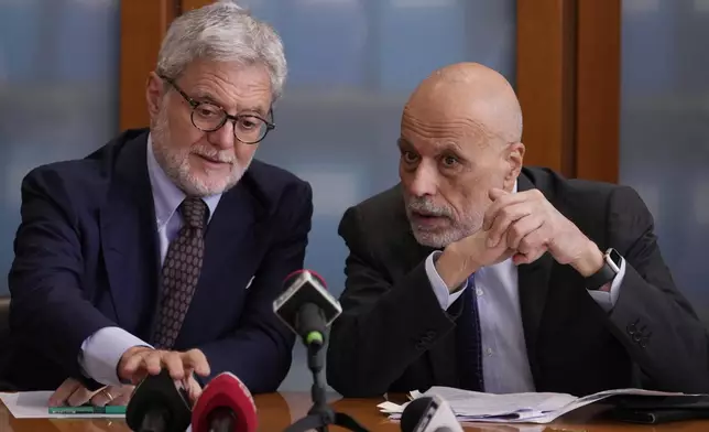 National Anti-Mafia Prosecutor Giovanni Milillo, left is flanked by Milan's Prosecutor Marcello Viola during a news conference at the Milan's court, in Milan, Italy, Monday, Sept. 30, 2024. (AP Photo/Luca Bruno)